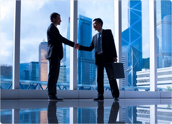 Business partners shaking hands